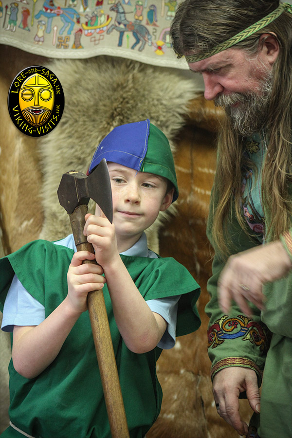 School child asking a question about a Viking axe - Part of an classroom presentation by Lore and Saga - Image copyrighted  Gary Waidson. All rights reserved.